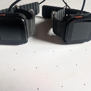 Pair of Truextreme3 Smart Watches with chargers